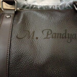 Leather weekender bag with shoe compartment engraved