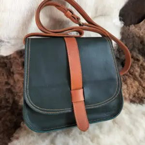 Green leather sling bag