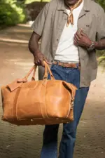 Tan or Light brown leather duffle