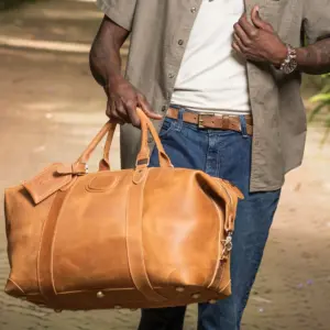 Tan or Light brown leather duffle