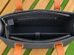 Leather tote interior with laptop compartment