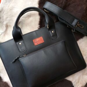 Leather laptop sleeve on desk