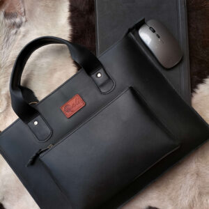 Leather laptop sleeve on desk