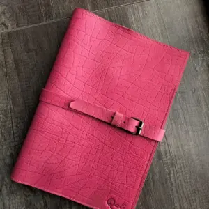 Pink leather laptop sleeve