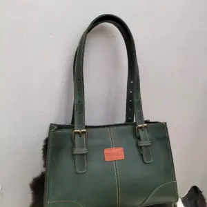 Rani mini leather tote in Forest Green