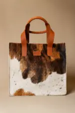 Brown and cream hair on tote