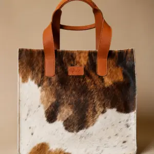 Brown and cream hair on tote