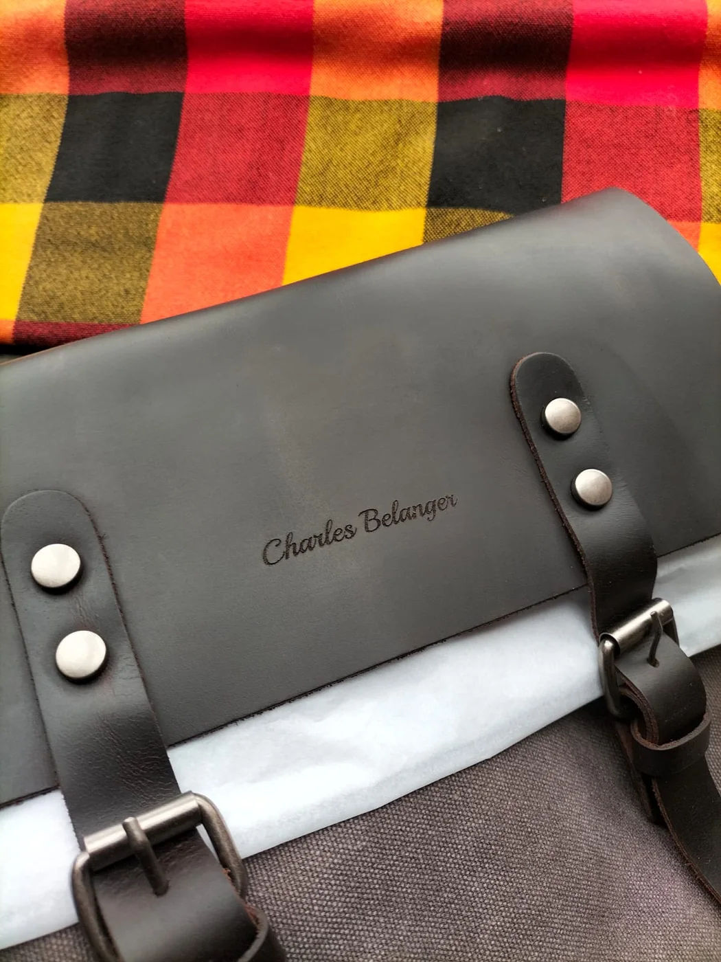 Personalised name engraved on a Qali leather bag